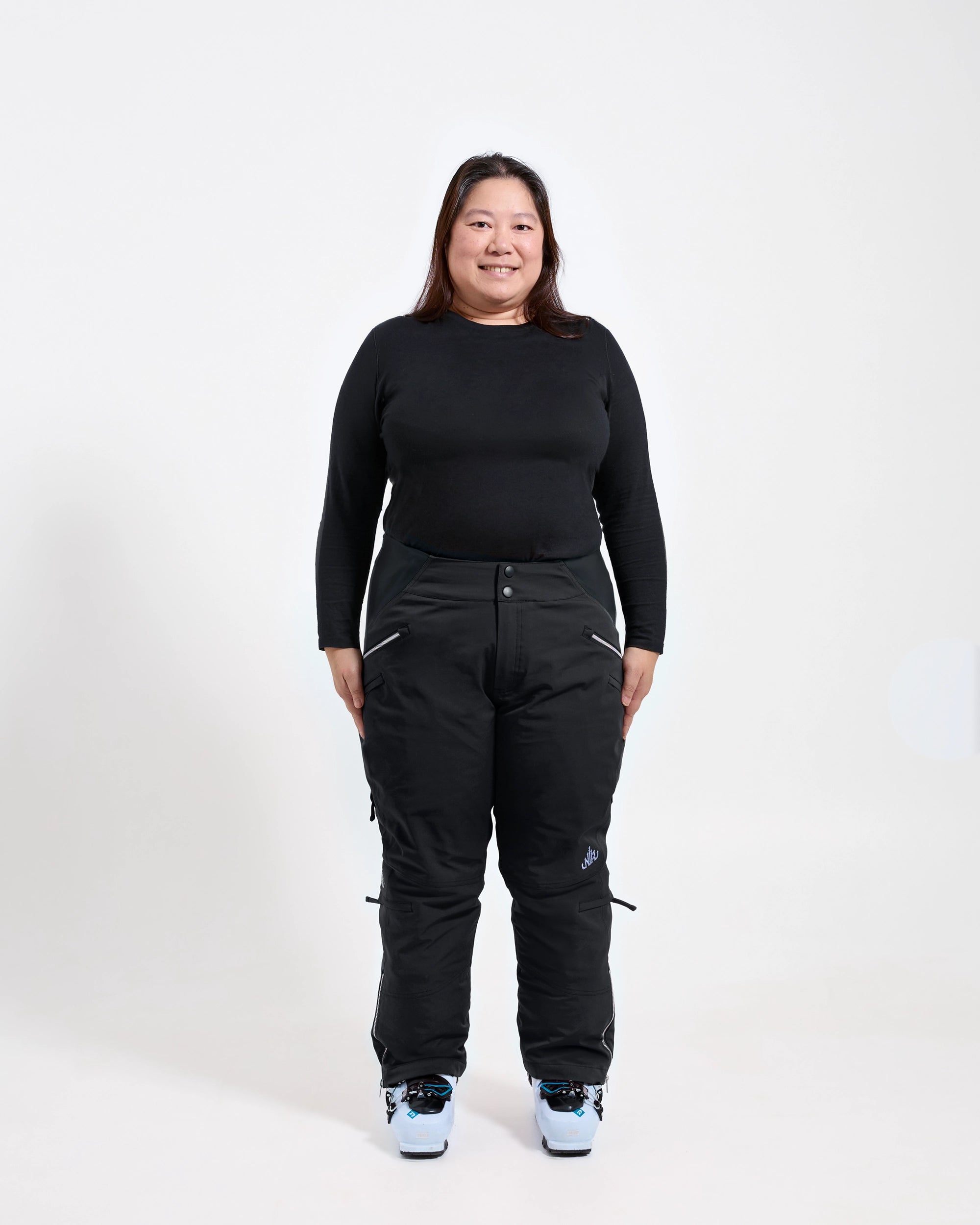 Beatrice short length snow pant in black, front view, shown on size AU16/US12 model. $Beatrice is wearing size AU16/US12 #colour_black